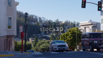 Traffic Crossing Junction On The Corner Of 17th Street And Clayton Street, San Francisco, USA