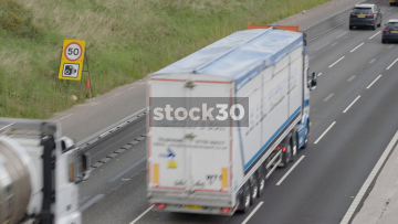 Two Shots Of Traffic On Busy M6 Motorway Near Junction 18 In Cheshire, UK
